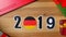 Illustration, new year, male hand put on the table on German flag, country ball, 2019