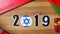 Illustration, new year, male hand put on the table on Israeli flag, country ball, 2019