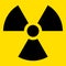 The illustration represents the symbol of radiation, product sign and radioactive debris