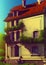 Illustration Of a Rustic European House and Lush Green Trees Under Blue Skies