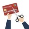 Illustration of scissors cutting a credit card