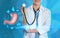 Illustration of stomach and doctor with stethoscope on light blue background, closeup