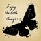 Illustration with text and grunge butterfly on yellow parchment