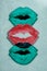 Illustration of three red and green lips on textured background