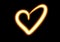 Illustration of a yellow fiery heart on a black background