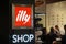 Illy caffÃ¨ shop signage outside a bar