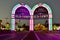 Iluminated entrance arches on colorful stores background at Old Town in 192 Highway area.