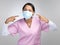 Im rocking my mask. You should to. Cropped portrait of an attractive young female healthcare worker wearing and pointing