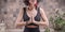 Image of an adult woman in yoga place. Meditation. The concept of yoga and spiritual practices