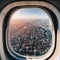 image of the aeroplane window viewing the beautiful outside aerial landscape.