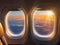 image of the aeroplane window viewing the beautiful outside aerial landscape.