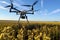 Image of an autonomous drone inspecting a wind turbine for maintenance.