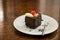 Image of baked confection on brown table. delicious brownie. celebratory dish