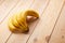 Image of Banana cluster on wooden table