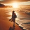 image of a beachcomber walking down a beach at sunset with waves breaking along.