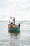 Image of boats and fishermen in Khmer beach. Traditional fishing in south east Asia.