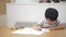 Image of a boy drawing