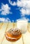 Image bread and milk on the wooden table