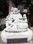 Image of Buddha surrounded by children at the Mileug-Am Buddhist temple. Gimhae, South Korea