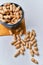 Image of bunch of peanuts in a bowl on a table