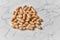 Image of bunch of peanuts on a marble table