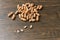 Image of bunch of peanuts on a wooden table