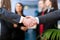 Image of business partners handshake on signing contract