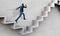 Image of businessman walking upstairs