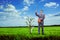 Image of businessman watering money tree