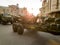 Image of cannon and military machines on streets of the big city. Military parade