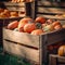 The image captures a rustic wooden crate filled with plump and bright orange pumpkins.