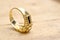 image of cheap used ring bijouterie on  wood background