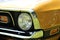 An image of a classic us car, vintage, headlight