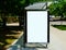 Image collage of bus shelter and white blank ad space glass side panel