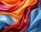 an image of a colorful silk fabric with a red orange and blue color scheme