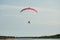 Image of couple flying on Moto paraglider