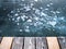 Image of crushed ice on frozen lake and wood planks