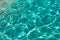 image of defocused turquoise water background. defocused turquoise water background