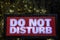 Image of do not disturb text water drop
