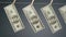 Image of dollars hanging on clothesline rope