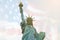 Image of double exposure statue of liberty and USA flag. Background for Independence day or Memorial day