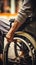 image of an elderly hand gripping a wheelchair rim, symbolizing aged resilience and mobility