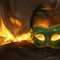 Image of elegant green venetian mask over tulle background.