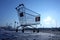 Image of empty shopping cart on empty parking near huge store