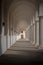Image features a classic hallway with white columns in Dresden, Germany