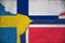 Image of flags of Sweden, Finland, Norway on a wall with a crack