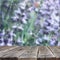 Image of front rustic wood boards and background of beautiful flowers field. bokeh lights overlay.ready for product display