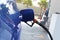 Image Fuel nozzle to refill fuel in car. - Concept energy,