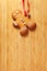 Image of Gingerbread man cookie over wooden texture