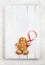 Image of Gingerbread man on white vintage cutting board